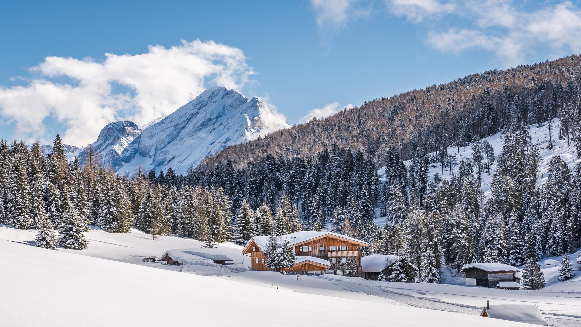 Panorama invernale della Marmolada | © Patricia Ramirez - Archivio Immagini ApT Val di Fassa La Marmolada vista da Campitello di Fassa in inverno | © Patricia Ramirez - Archivio Immagini ApT Val di Fassa